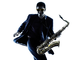 man saxophonist playing saxophone silhouette