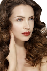 Fototapeta na wymiar Beautiful model showing healthy brown wavy hair