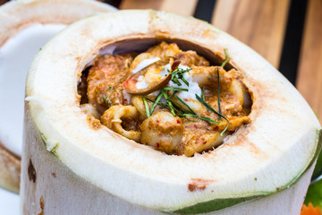 Curry Steamed Seafood in Coconut Cup