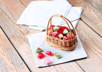 Basket with colorful sweet candies