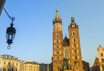 Fototapeta premium Mariacki church in Rynek Glowny - The main square of Krakow.
