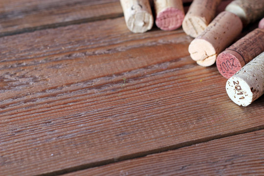 Wine corks lying on a wooden table