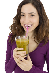 Woman drinking green vegetable juice