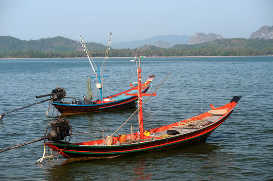 Traditional fishing long tailed boat in Koh Phitak island.