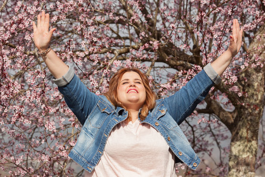Grateful woman celebrating spring