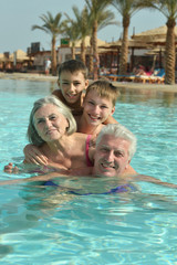 grandparents with their grandchildren