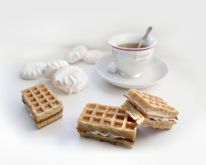 Tea with waffles and marshmallows