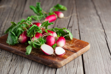 Fresh radish on a wooden table