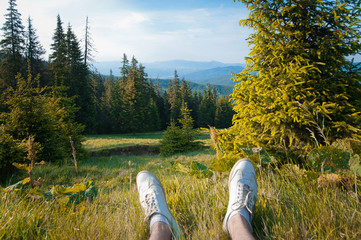 Human legs and landscape