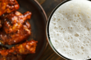 Beer with buffalo wings
