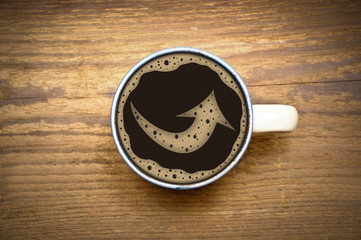 Pfeil im Kaffee