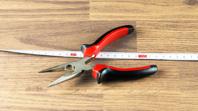 Pliers and measuring tape