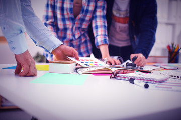 Young business people working at office on new project