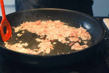 fry onion in pan
