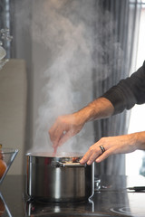 steaming preparation at kitchen
