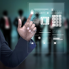 Businessman pressing virtual buttons