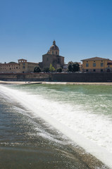 Sunny view of Church San Frediano in Cestello and river Arno.