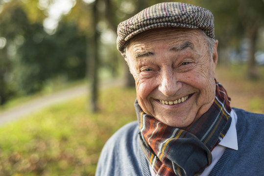 Portrait of happy senior man outdoors