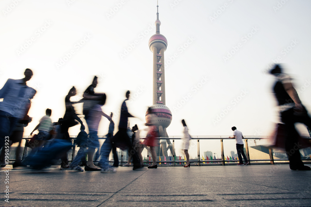 Wall mural landmark and walking people in Shanghai.