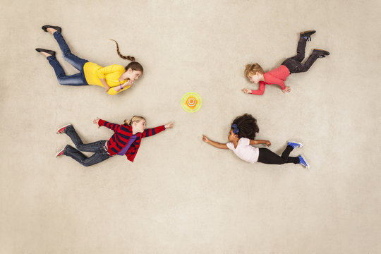 Children discovering new mini gadget