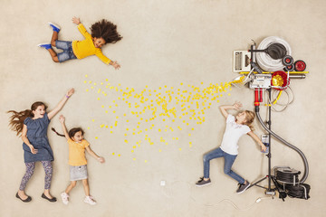 Children experimenting with new money machine