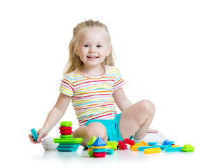 kid girl playing color toys