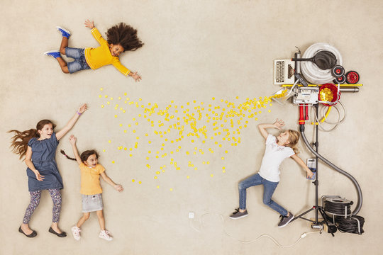 Children experimenting with new money machine