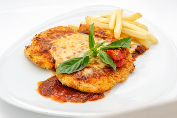 Chicken fillet with french fries and sauce