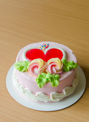 Cake flower and heart topping