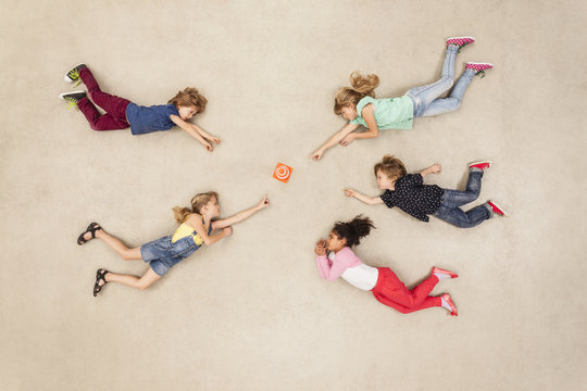 Children discovering new mini gadget
