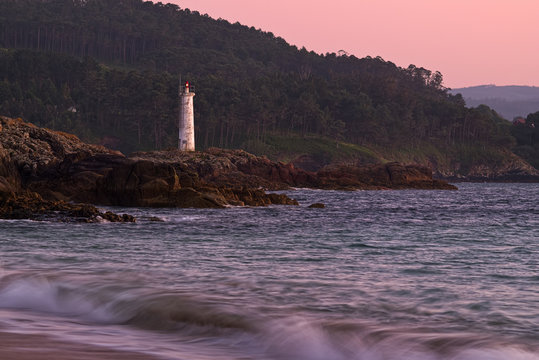 Spain, Galicia, Lighthouse at beach of Leis de Nemancos