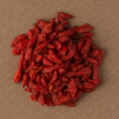 Circle of dry red goji berries