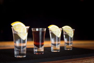 Brandy and  three tequila shots with lemon