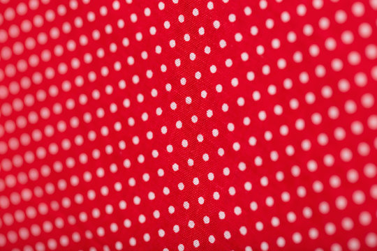 red cotton fabric with white polka dots