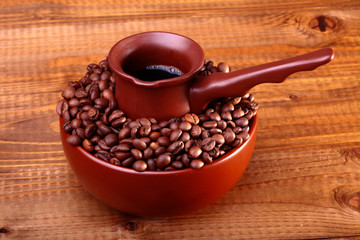 Coffee beans in bowl with Finjan