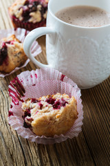 Cup cocoa with milk and homemade black berry muffins