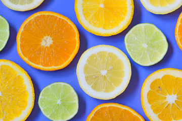 Fototapeta na wymiar Slices of various citrus fruits