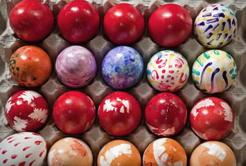 colored Easter eggs and hand-painted in a box
