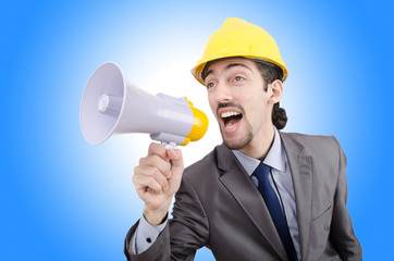 Fototapeta premium Man shouting and yelling with loudspeaker