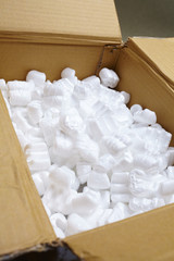 Fototapeta na wymiar packing box with white packaging filling