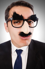 Funny businessman with eyebrows and moustache