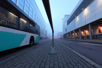 Urban road in the morning mist