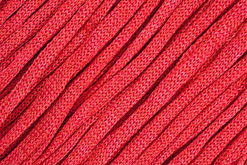 Pink stockinet ribbons background