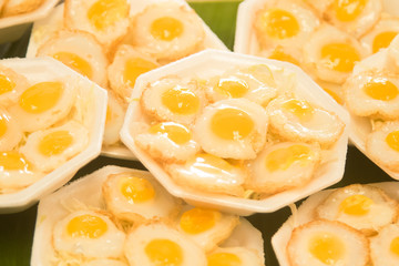Thai style dessert , Quail eggs put it in the mortar