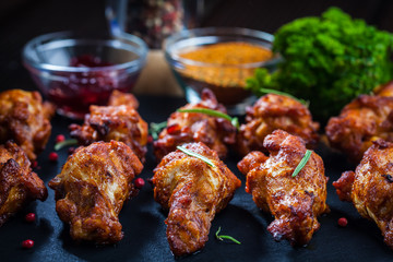 BBQ chicken wings with spices and dip