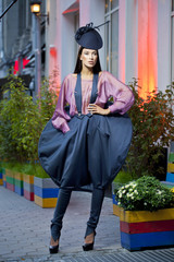 Young beautiful model in a stylish designer clothes