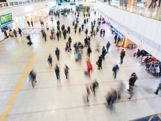 Passengers inside of Seoul Station.