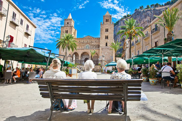 Main square of Cefalu, medieval city of Sicily, Italy.