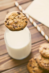 chocolate cookies and milk in jar