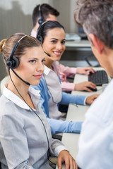 Fototapeta premium Customer Service Executives Looking At Manager